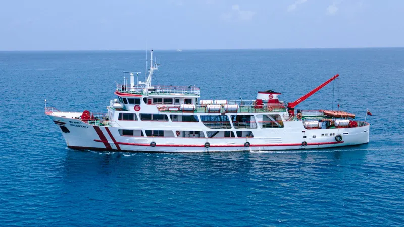 Aerial view of Andaman ferry crossing turquoise waters in peak season