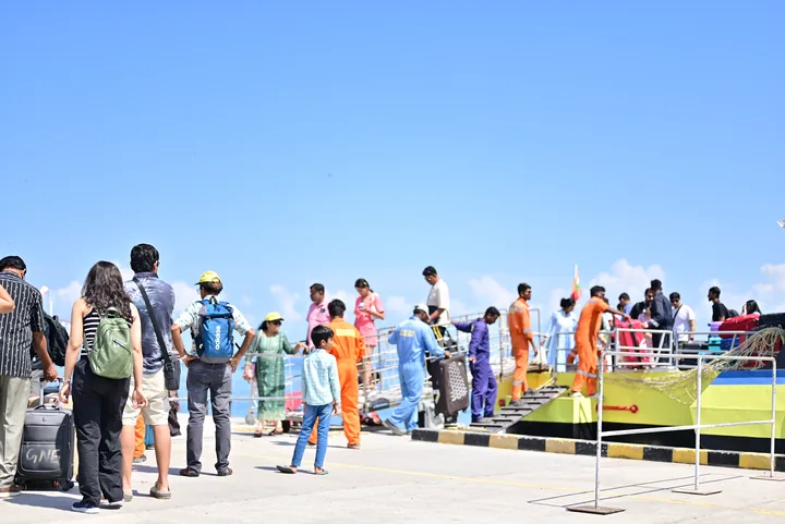 Passengers boarding a Makruzz ferry at an Andaman island jetty