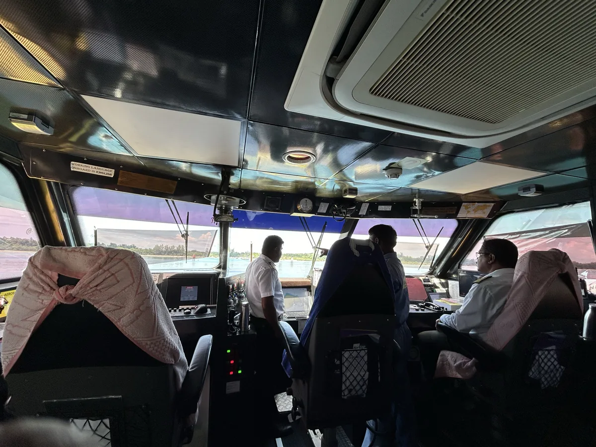 On the bridge — professional crew behind the 85% on-time record Nautika bridge crew navigating during a crossing