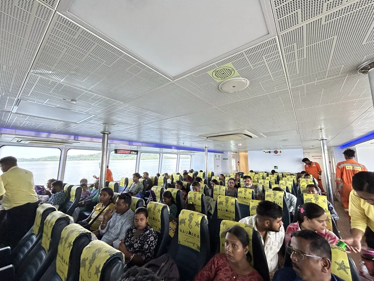 Nautika Luxury class, seat covers and all — a real sailing Nautika Luxury class cabin with branded seat covers, mid-journey
