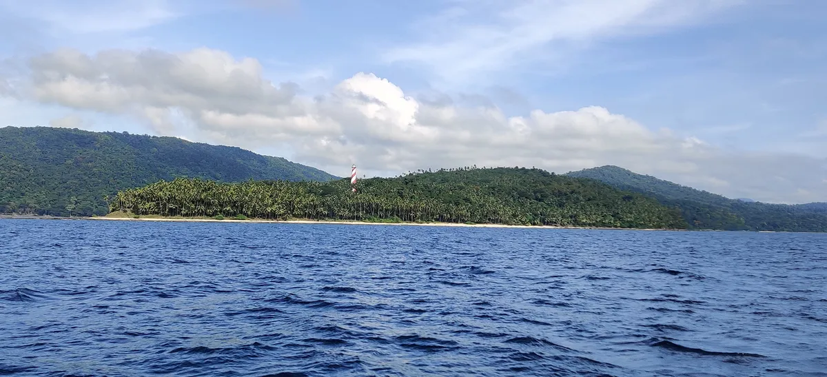 Approaching North Bay Island by boat — the lighthouse that featured on the old ₹20 note