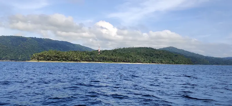 Approaching North Bay Island by boat — the lighthouse from the old ₹20 note
