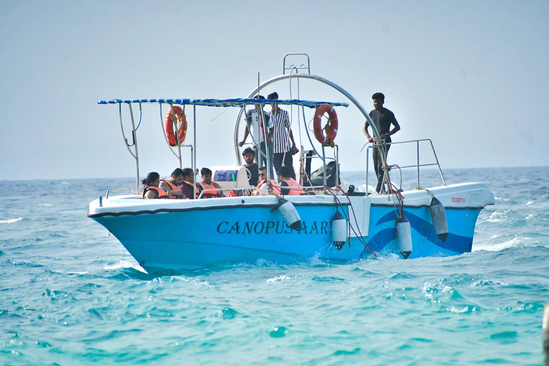 Speedboat full of travellers heading to Elephant Beach, Havelock